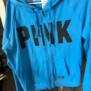 Bright blue zip up jacket perfect condition.